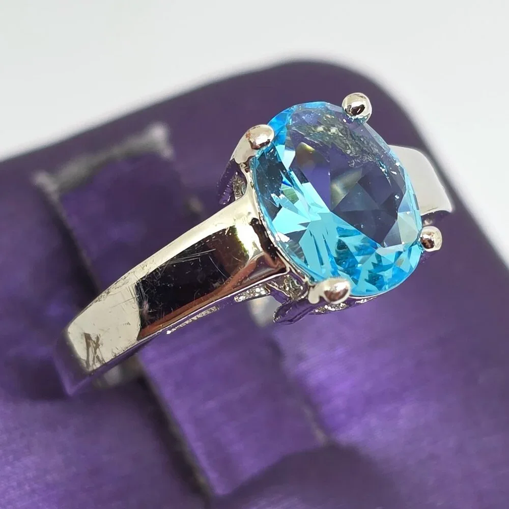 Beautiful Silver Oval Faceted Light Blue Rhodium Plated Solitaire Ring Sz 6.75
